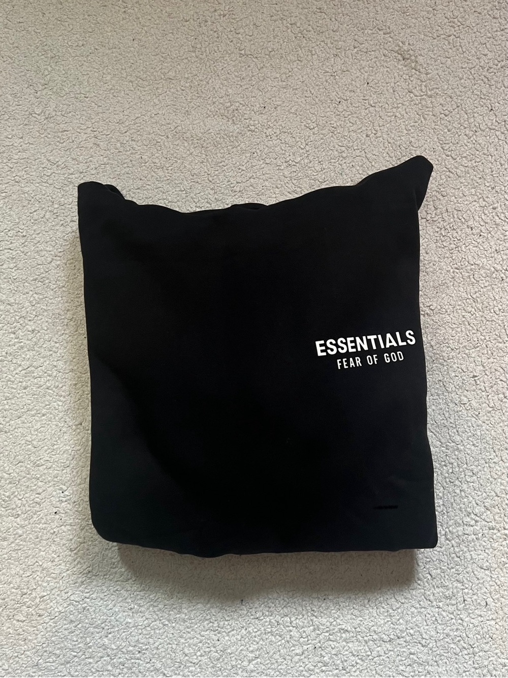 Fear of God Essentials Black Sweatshirt with White Logo Chest Print